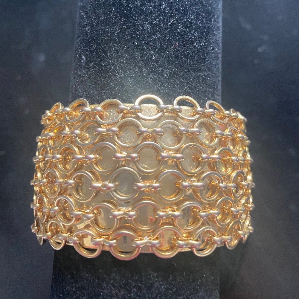 Beautiful gold bangle/cuff with ring design
